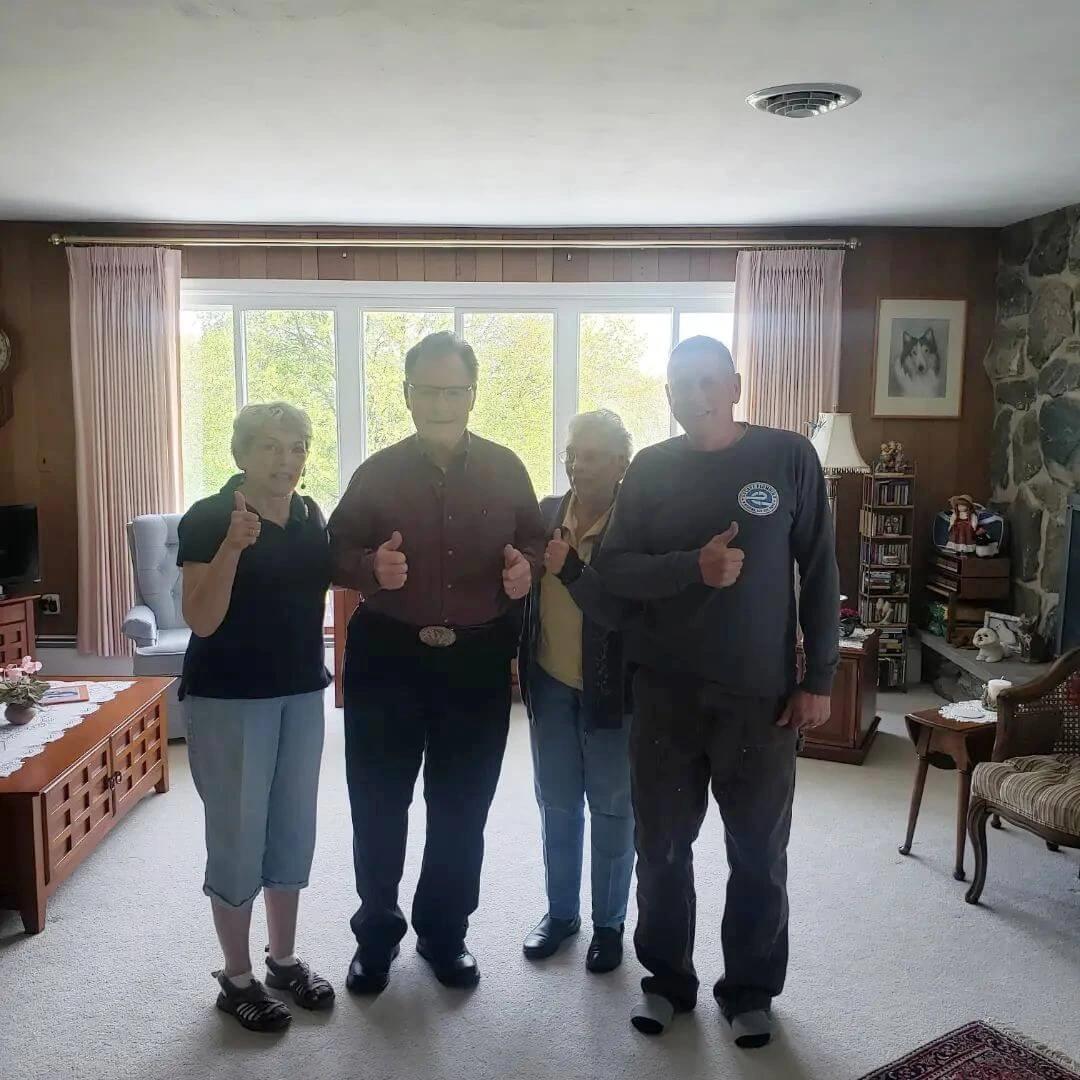 Eric with happy plumbing customers